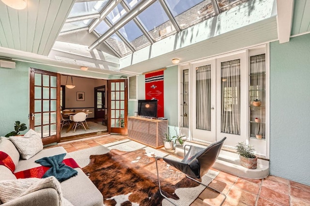 809 Edgecliff Ter, Austin, TX 78704 - sunroom / solarium with french doors, healthy amount of natural light, vaulted ceiling, and a skylight