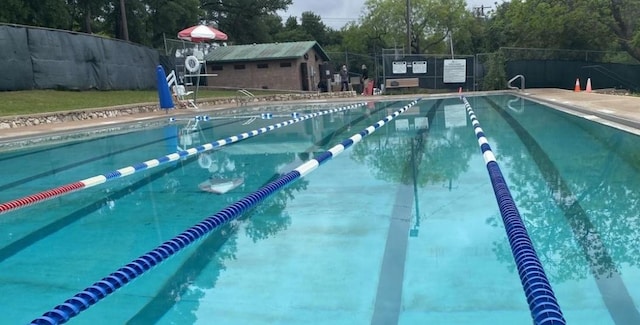 809 Edgecliff Ter, Austin, TX 78704 - community pool with view of wooded area