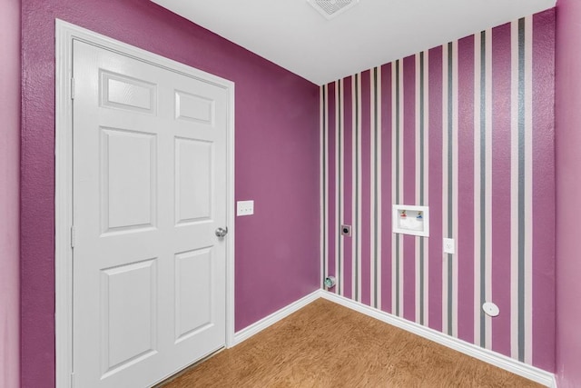 128 2nd Ave, Taylor, TX 76574 - empty room featuring carpet floors and wallpapered walls