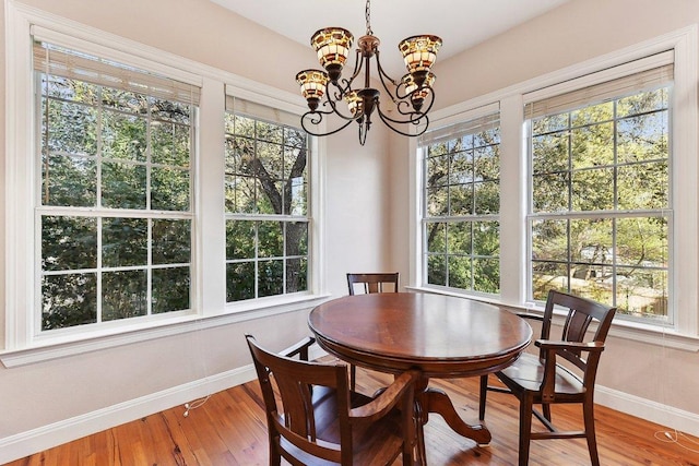 201 Mcconnell Dr, West Lake Hills, TX 78746 - dining space featuring a chandelier and wood finished floors