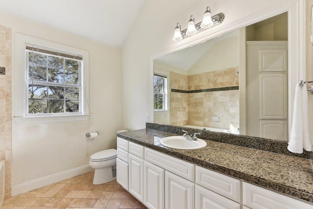 201 Mcconnell Dr, West Lake Hills, TX 78746 - full bathroom with lofted ceiling, vanity, a tile shower, and stone finish flooring