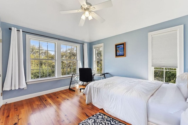 201 Mcconnell Dr, West Lake Hills, TX 78746 - bedroom featuring multiple windows, wood finished floors, and a ceiling fan