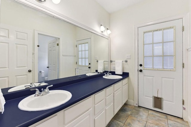 201 Mcconnell Dr, West Lake Hills, TX 78746 - bathroom with double vanity and tile patterned flooring