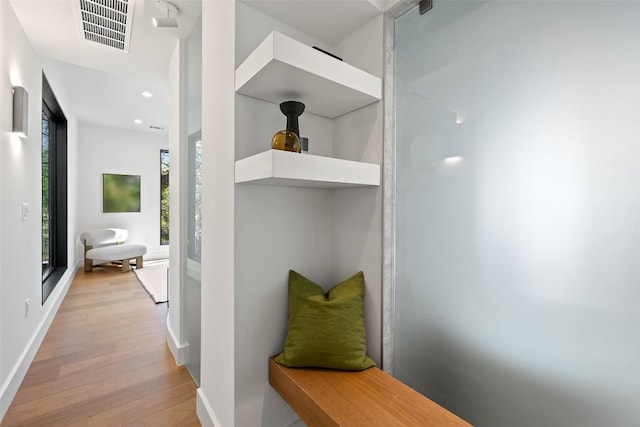 2218 Haskell St, Austin, TX 78702 - hall with light wood-type flooring and recessed lighting