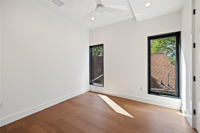2218 Haskell St, Austin, TX 78702 - unfurnished room with plenty of natural light, light wood-style flooring, recessed lighting, and baseboards