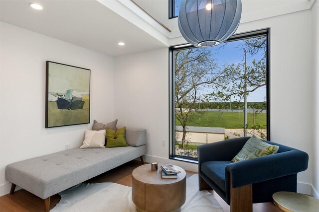 2218 Haskell St, Austin, TX 78702 - sitting room with recessed lighting, wood finished floors, plenty of natural light, and baseboards