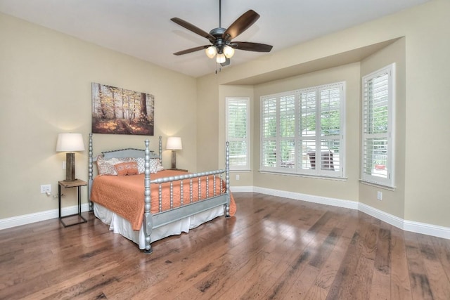 204 Whippoorwill Cv, Georgetown, TX 78633 - bedroom with hardwood / wood-style floors, baseboards, and a ceiling fan