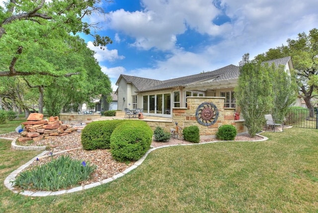 204 Whippoorwill Cv, Georgetown, TX 78633 - back of house featuring a shingled roof, stone siding, a patio, and stucco siding