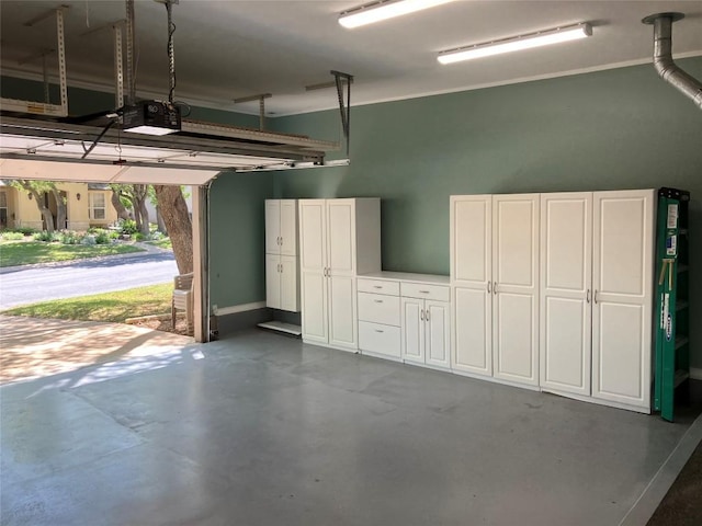 204 Whippoorwill Cv, Georgetown, TX 78633 - garage featuring a garage door opener