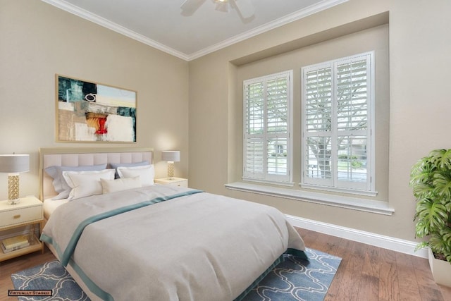 204 Whippoorwill Cv, Georgetown, TX 78633 - bedroom with crown molding, wood finished floors, baseboards, and ceiling fan