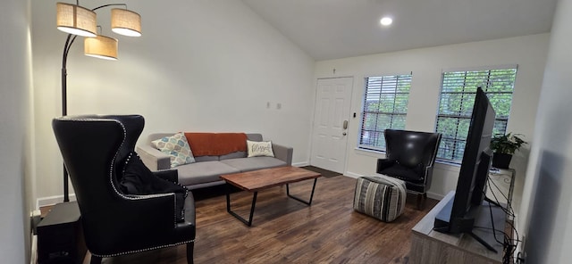 living room featuring baseboards, vaulted ceiling, recessed lighting, and dark wood-type flooring