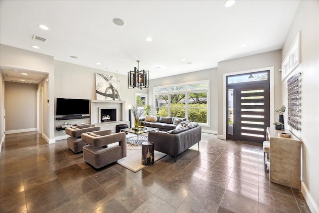 2304 Mccullough St, Austin, TX 78703 - living area with baseboards, recessed lighting, and a chandelier