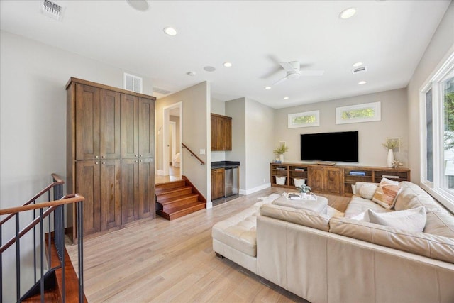 2304 Mccullough St, Austin, TX 78703 - living room with light wood-style floors, recessed lighting, a ceiling fan, and baseboards