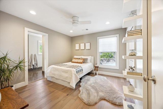 2304 Mccullough St, Austin, TX 78703 - bedroom featuring wood finished floors, baseboards, recessed lighting, and a ceiling fan