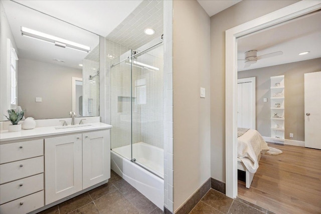 2304 Mccullough St, Austin, TX 78703 - full bathroom featuring vanity, enclosed tub / shower combo, baseboards, and recessed lighting