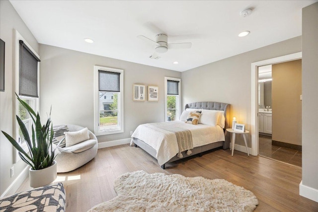 2304 Mccullough St, Austin, TX 78703 - bedroom featuring baseboards, wood finished floors, ceiling fan, and recessed lighting