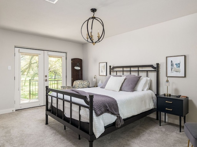 6022 Tonkowa Trl, Georgetown, TX 78628 - carpeted bedroom featuring a chandelier, access to outside, and french doors
