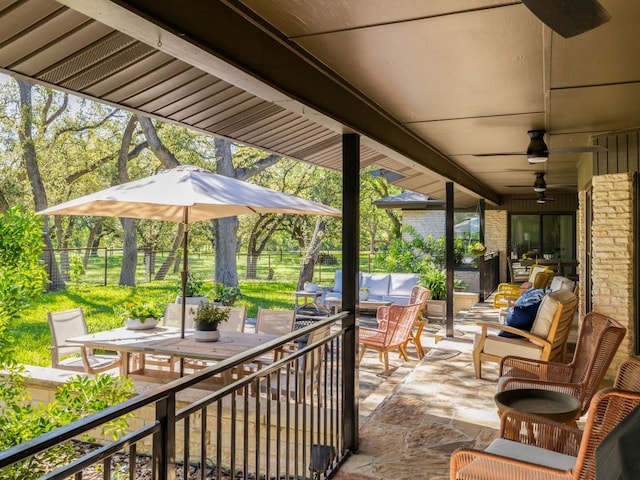6022 Tonkowa Trl, Georgetown, TX 78628 - fenced backyard featuring outdoor dining space, outdoor lounge area, a patio area, and a ceiling fan
