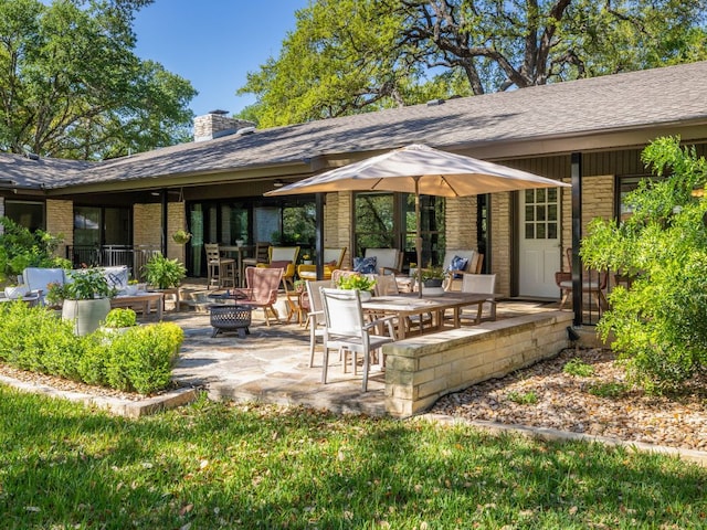 6022 Tonkowa Trl, Georgetown, TX 78628 - view of patio with an outdoor fire pit