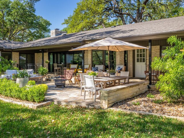 6022 Tonkowa Trl, Georgetown, TX 78628 - view of patio / terrace featuring a fire pit
