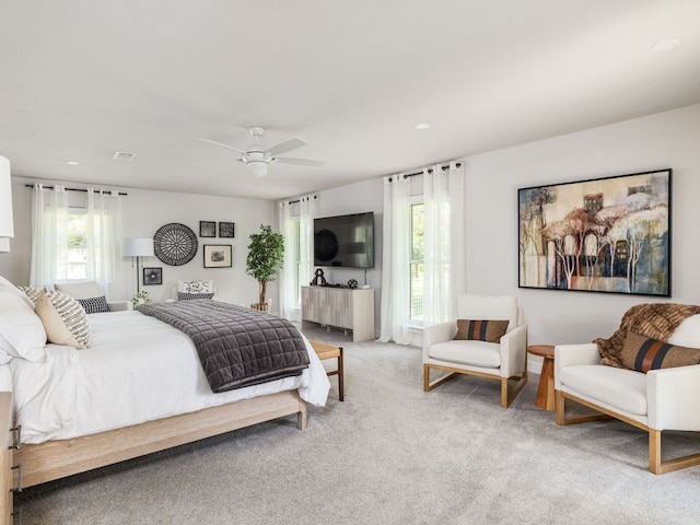 6022 Tonkowa Trl, Georgetown, TX 78628 - bedroom with light carpet, ceiling fan, and recessed lighting