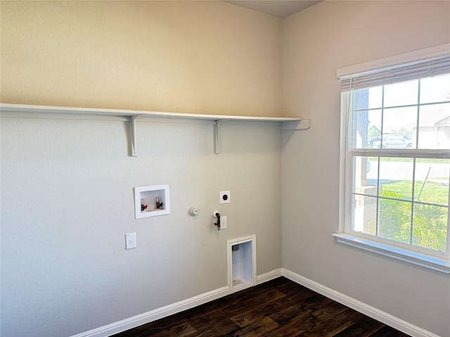 3409 Brywood Dr, Pflugerville, TX 78660 - laundry room featuring hookup for an electric dryer, gas dryer hookup, dark wood-style flooring, and plenty of natural light