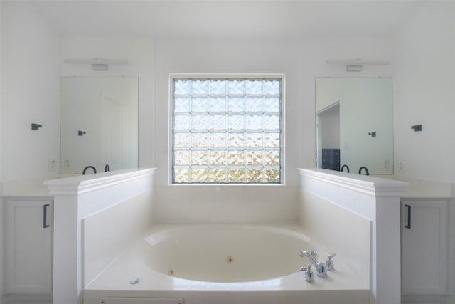 11700 Misty White Dr, Austin, TX 78717 - full bathroom featuring a whirlpool tub and vanity