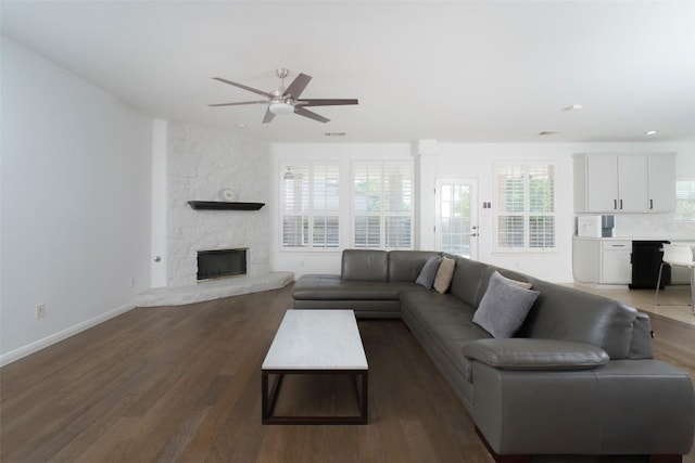 11700 Misty White Dr, Austin, TX 78717 - living room with a ceiling fan, wood finished floors, a fireplace, and recessed lighting