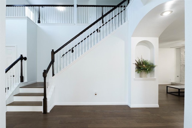 11700 Misty White Dr, Austin, TX 78717 - stairs with wood finished floors and a towering ceiling