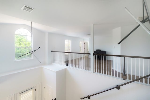 11700 Misty White Dr, Austin, TX 78717 - hallway featuring an upstairs landing and vaulted ceiling