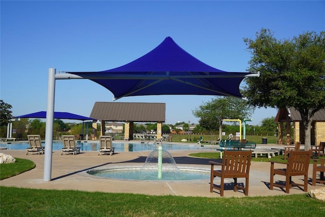 3505 Grail Hollows Rd, Pflugerville, TX 78660 - view of home's community featuring a swimming pool and a patio