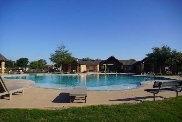 3505 Grail Hollows Rd, Pflugerville, TX 78660 - community pool featuring a patio area