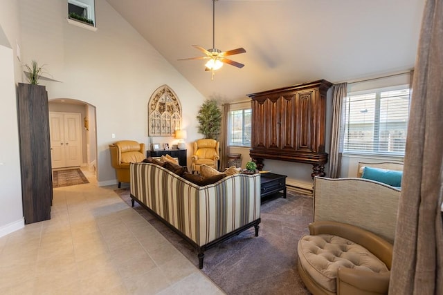 702 Silo St, San Marcos, TX 78666 - living area featuring ceiling fan, arched walkways, high vaulted ceiling, and light tile patterned floors