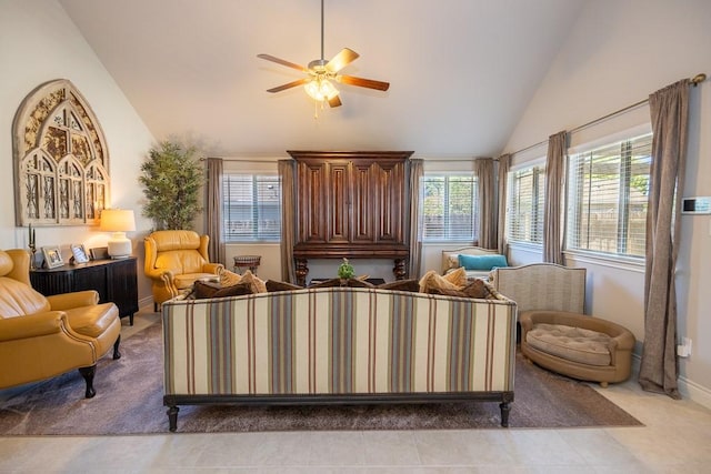 702 Silo St, San Marcos, TX 78666 - living area with a ceiling fan, light tile patterned floors, high vaulted ceiling, and light colored carpet