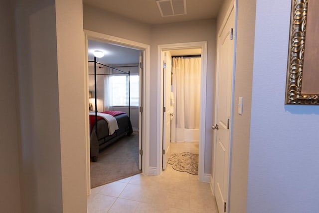 702 Silo St, San Marcos, TX 78666 - hall with light tile patterned flooring and light colored carpet