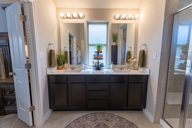 702 Silo St, San Marcos, TX 78666 - full bath featuring double vanity, a shower stall, and tile patterned floors
