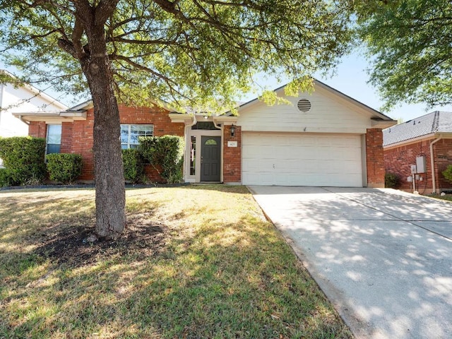 429 Falcon Ln, Leander, TX 78641 - ranch-style home with an attached garage, brick siding, concrete driveway, and a front lawn