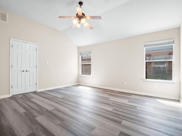 429 Falcon Ln, Leander, TX 78641 - unfurnished room with lofted ceiling, ceiling fan, and wood finished floors