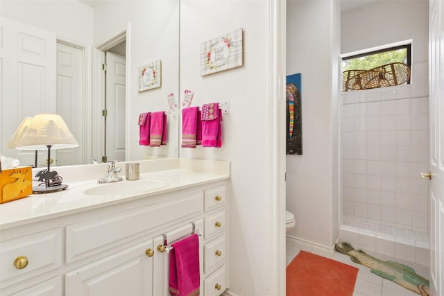901 Blaylock Dr, Salado, TX 76571 - bathroom featuring vanity, tiled shower, and tile patterned floors