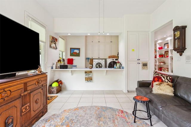 901 Blaylock Dr, Salado, TX 76571 - living area featuring washer and clothes dryer and light tile patterned flooring