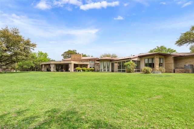 901 Blaylock Dr, Salado, TX 76571 - view of green lawn with a sunroom