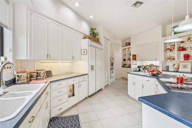 901 Blaylock Dr, Salado, TX 76571 - kitchen featuring electric stovetop, white cabinets, recessed lighting, dark countertops, and light tile patterned floors