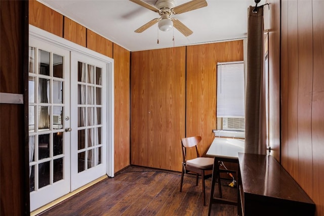 19 Deerfield Dr Unit 2, Wimberley, TX 78676 - sitting room featuring dark wood-type flooring, a ceiling fan, cooling unit, and wooden walls