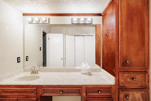 19 Deerfield Dr Unit 2, Wimberley, TX 78676 - bathroom featuring vanity and a textured ceiling