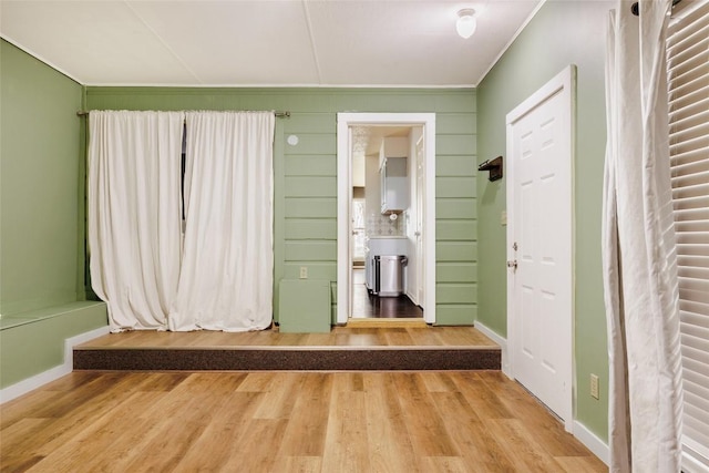 19 Deerfield Dr Unit 2, Wimberley, TX 78676 - unfurnished bedroom featuring wood finished floors and ornamental molding