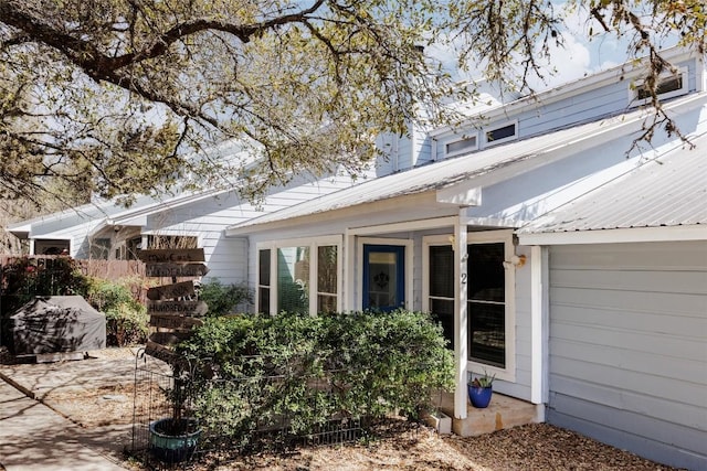 19 Deerfield Dr Unit 2, Wimberley, TX 78676 - rear view of property with a metal roof