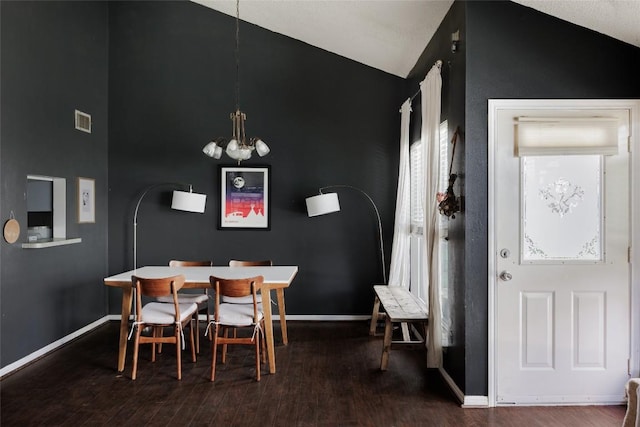 19 Deerfield Dr Unit 2, Wimberley, TX 78676 - dining space featuring vaulted ceiling, wood finished floors, and a chandelier