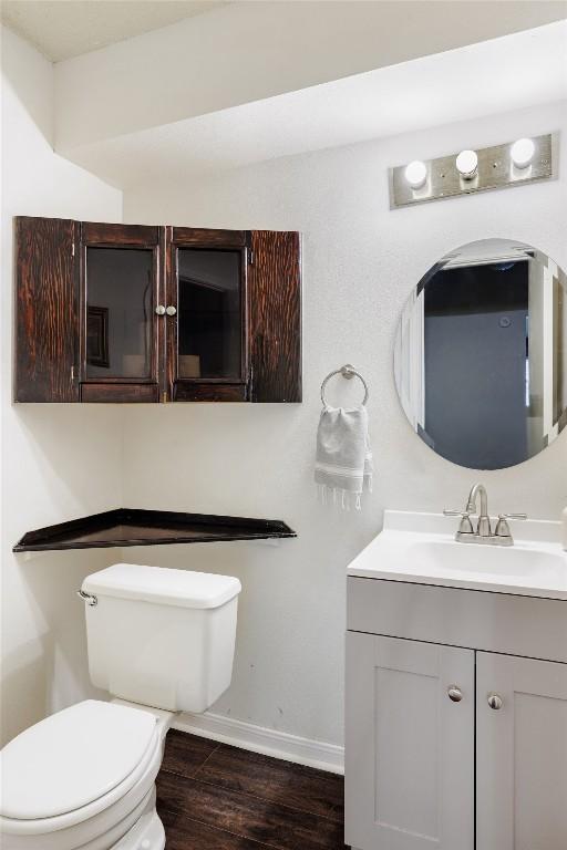 19 Deerfield Dr Unit 2, Wimberley, TX 78676 - bathroom featuring vanity and wood finished floors