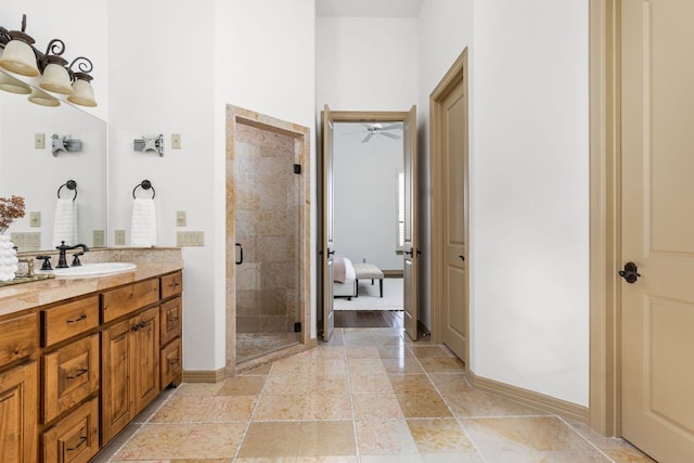 219 Jack Nicklaus Dr, Austin, TX 78738 - bathroom with vanity, a stall shower, and ceiling fan