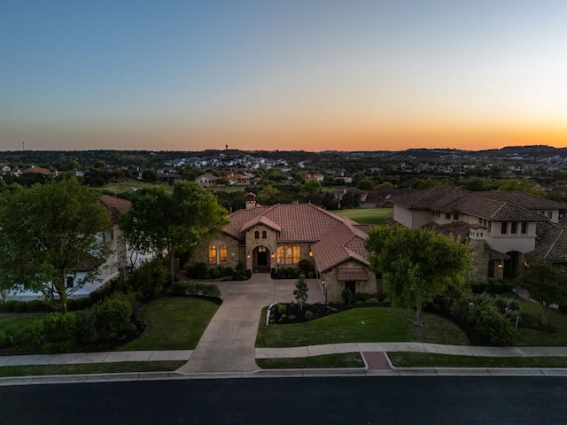 219 Jack Nicklaus Dr, Austin, TX 78738 - mediterranean / spanish home featuring a tile roof, a chimney, a front lawn, and driveway